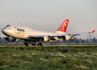 N674US @ EHAM - Landing on runway R18 of Schiphol Airport - by Willem Göebel