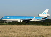 PH-KCF @ EHAM - Landing on runway R18 of Schiphol Airport - by Willem Göebel