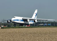 RA-82079 @ AMS - Landing on runway R18 of Schiphol Airport - by Willem Göebel