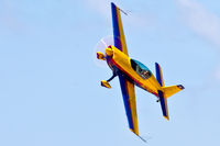 N134EE @ KPIA - Kerry Tidmore starts a showline pass at the 2006 River City Air Expo - by Thomas D Dittmer