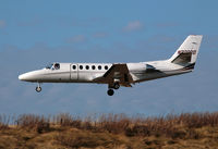 N380RD @ PHL - Cessna Citation 560 touching down on elevated Rwy 26 at PHL. - by T.P. McManus