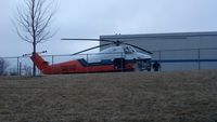 N827MW - helicopter putting cooling units on a commercial building - by Parsons