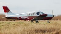 G-BOPC @ EGFH - Piper Cherokee Warrior II of Aeros Flight Training waiting for departure. - by Roger Winser