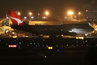 VH-OEF @ KLAX - Qantas 747 in old colors taxies past VH-OEG at 1206AM - by Jonathan Ma