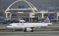 N430UA @ KLAX - Just arrived at LAX on 25L - by Todd Royer