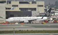 N26210 @ KLAX - Taxiing for departure - by Todd Royer