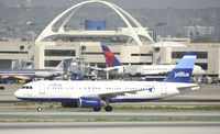 N635JB @ KLAX - Arrived on 25L - by Todd Royer