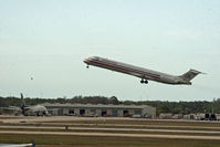 N595AA @ RSW - MD-83 taking off at RSW - by Mauricio Morro
