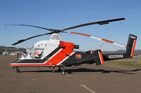 N202WM @ SEE - HeliQuest Kaman, one of two parked together at Gillespie - by Duncan Kirk