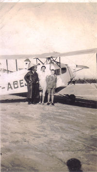 G-ACEJ @ ?? - This was in a collection of photographs belonging to my late Aunt. No idea who or where the people are but I guess the aircraft would not have been too old then.  Any information gratefully received!! - by Hilary Williams