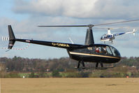 G-DMRA @ EGBO - Helicopters training at Wolverhampton Airport - by Terry Fletcher