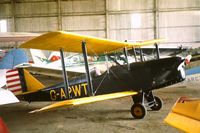G-APWT - Tucked away in the hangar at Booker C1972 - by Lee Mullins