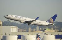 N33203 @ KLAX - Departing LAX on 25R - by Todd Royer