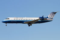 N403SW @ LAX - United Express (SkyWest Airlines) N403SW (FLT SKW6425) from Las Vegas McCarran Int'l (KLAS) on short final to RWY 25L. - by Dean Heald