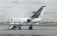 VH-BIZ @ YMEN - This image was scanned from a b&w print taken some time in the early 1960's at Essendon. This was the first business jet in Australia and the only example of the Falcon 20CC built, with dual wheels and low pressure tyres for use on unimproved strips.