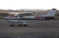 G-BEZO @ EGFH - Visiting Reims/Cessna 172 Skyhawk of Staverton Flying School. - by Roger Winser