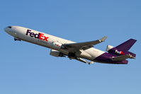 N625FE @ LAX - FedEx Aaliya N625FE (FLT FDX849) climbing out from RWY 25L en route to Memphis Int'l (KMEM). - by Dean Heald