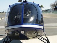 N18PD @ POC - Parked on the westside helipad facing into the sun - by Helicopterfriend