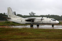 ER-AFH @ MZBZ - The weather was as bad as the state of this aircraft. According to my guide in Belize this plane was used in a drugs-related flight, abandoned by the drugsdealers and since then parked next to the runway for display. - by Connector