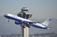 N593UA @ KLAX - Departing LAX on 25R - by Todd Royer