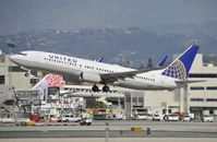 N16217 @ KLAX - Departing LAX on 25R - by Todd Royer