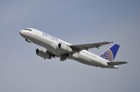 N416UA @ KLAX - Departing LAX on 25R - by Todd Royer