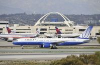 N574UA @ KLAX - Taxiing to gate at LAX - by Todd Royer