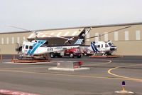N408KC @ KFUL - Parked at the OCFA ramp with a Santa Barbara County chopper N205FD - by Nick Taylor Photography