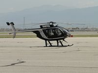 N987CB @ CNO - Parked on a pad southeast of the tower - by Helicopterfriend