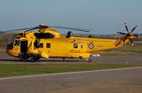 ZH542 @ EGFH - Sea King of A Flight 22 Squadron RAF basking in the sun after taking on fuel. - by Roger Winser