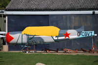 G-CBVT @ EGLM - Bacau YAK-52 fuselage on stands at White Waltham - by moxy