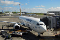 DQ-FJG @ NZAA - Busy apron with Air NZ's B744, B773, and A320, SQ's B773, and of course FJ's B738 in the front - by Micha Lueck