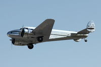 N18097 @ LAL - 1938 Lockheed 12A, c/n: 1250 leaving 2012 Sun N Fun - by Terry Fletcher