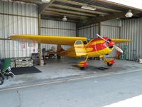 N9833A @ CNO - Still in the hanger, but getting ready to go flying - by Helicopterfriend