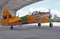 N452WA @ ISM - 1945 North American SNJ-6, c/n: 112034 outside Kissimmee Air Museum - by Terry Fletcher