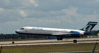 N950AT @ RSW - airTran burning some rubber at RSW - by Mauricio Morro