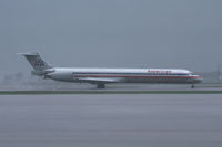 N469AA @ AFW - American Airlines Super80 diverted to Alliance Airport during heavy rains. - by Zane Adams