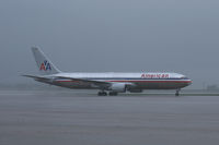 N369AA @ AFW - American Airlines 767 diverted to Alliance Airport during heavy rains.