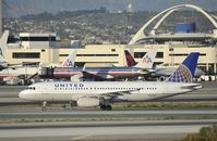 N421UA @ KLAX - Taxiing to Gate at LAX - by Todd Royer