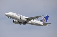 N832UA @ KLAX - Departing LAX on 25R - by Todd Royer