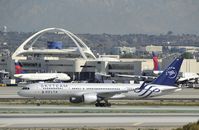 N722TW @ KLAX - Taxiing to gate at LAX - by Todd Royer