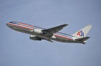 N335AA @ KLAX - Departing LAX on 25R - by Todd Royer