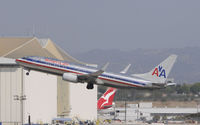 N958AN @ KLAX - Departing LAX on 25R - by Todd Royer