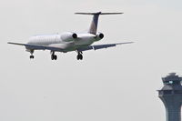 N19554 @ KORD - ExpressJet/United Express Embraer EMB-145LR, ASQ5812 arriving from Linclon/KLNK, RWY 28 approach KORD. - by Mark Kalfas