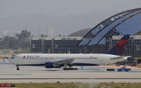 N140LL @ KLAX - Taxiing for departure at LAX - by Todd Royer