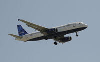N775JB @ KLAX - Arriving at LAX on 24R - by Todd Royer