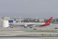 VH-VPE @ KLAX - Getting towed to storage to wait for next flight - by Todd Royer