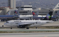 XA-VOF @ KLAX - Taxiing to gate at LAX - by Todd Royer
