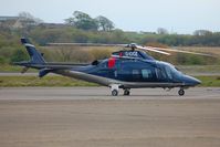G-IOOZ @ EGFH - Visiting Agusta Grand helicopter. - by Roger Winser