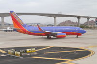 N967WN @ KPHX - Southwest Airlines Boeing 737-7H4, N967WN at TWY D - D13,  taxiing to RWY 25R Phoenix Sky Harbor. - by Mark Kalfas